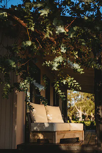 sillón de exterior con almohadones